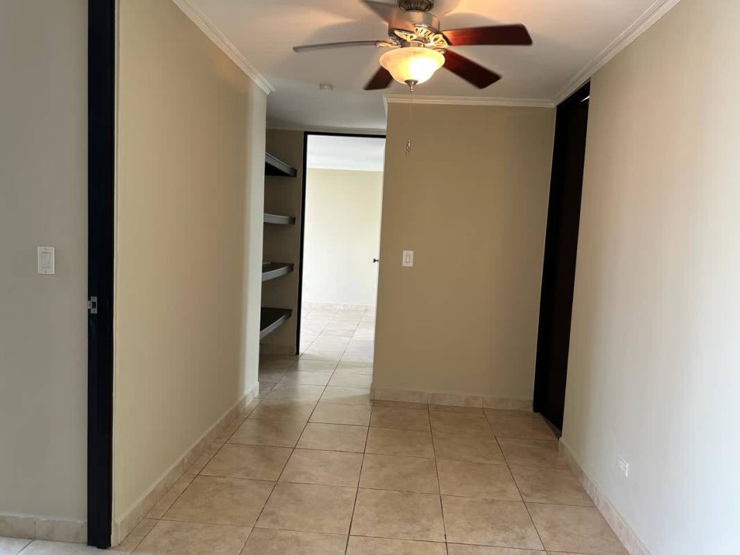 Guest bedroom featuring closet, AC and city view at PH Kubic in El Cangrejo Panama