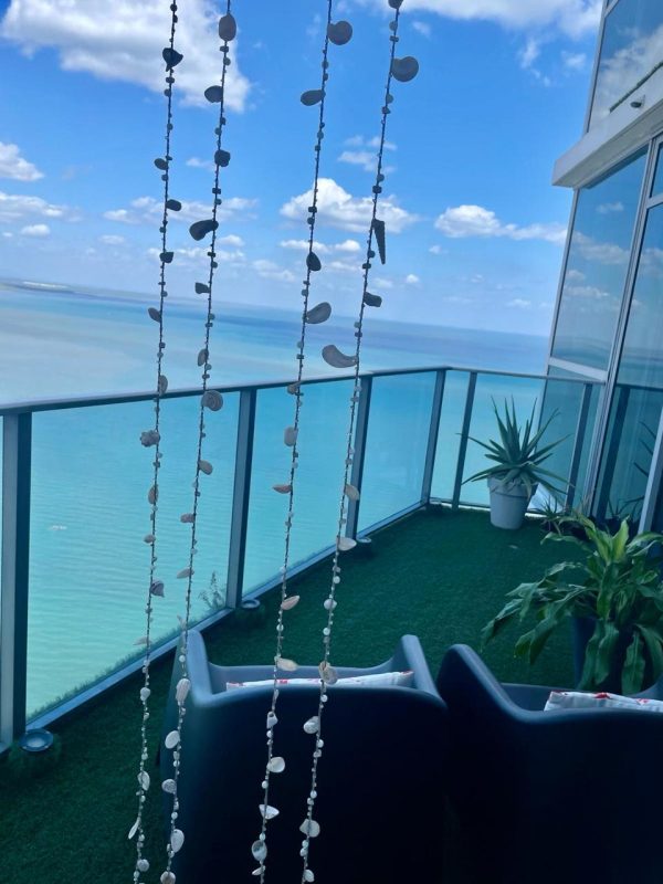 Spacious master bedroom with sea view balcony luxury furnished loft Grand Tower Panama