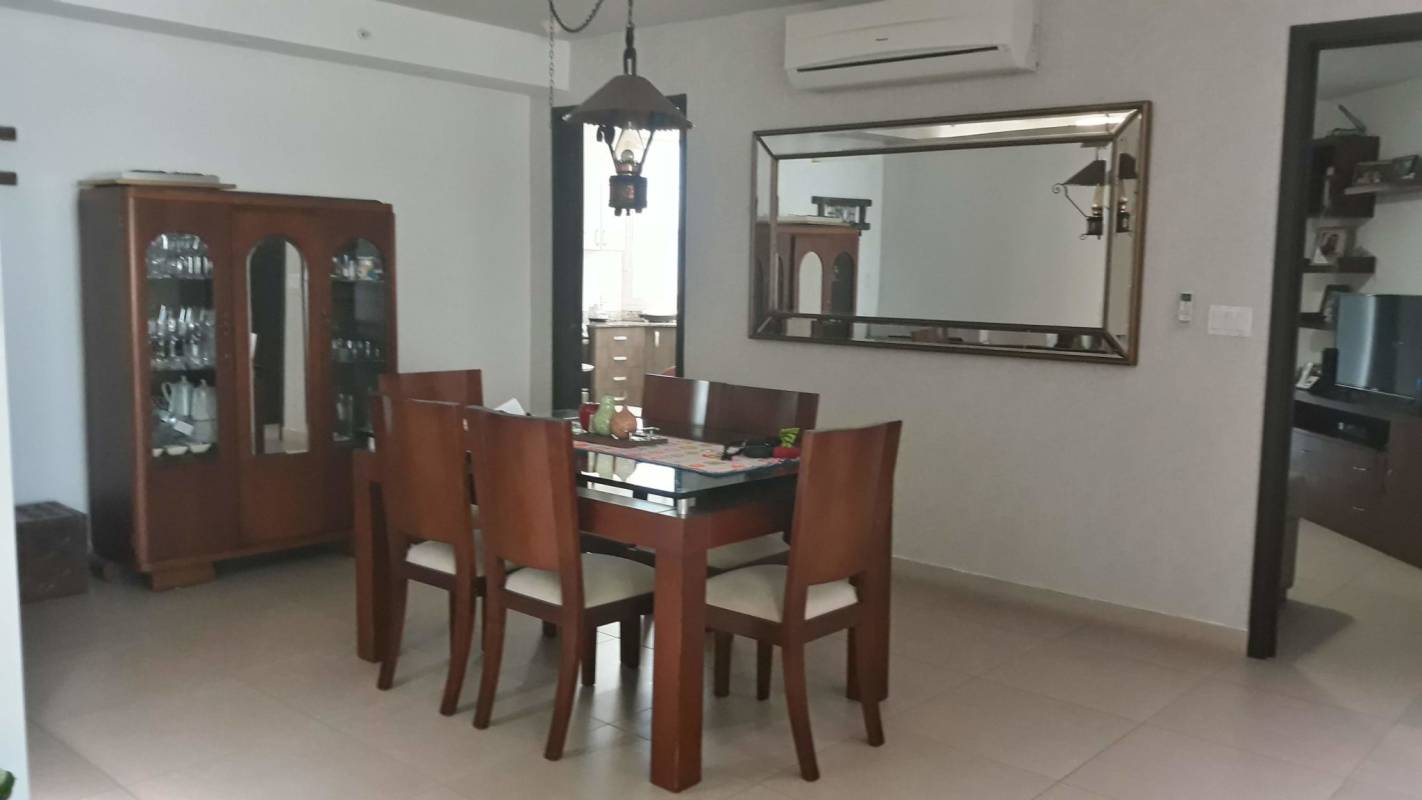 Spacious master bedroom featuring large windows with panoramic views in Costa del Este Panama