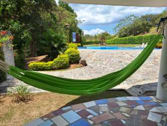 Landscaped picnic area with benches umbrellas and gardens The Valle Village Las Uvas Panama