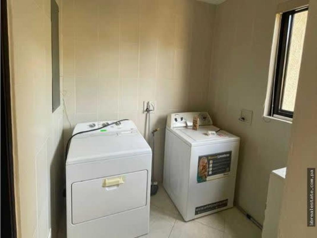 Bathroom featuring tile walls and vanity inside PH Embassy Gardens Clayton Panama