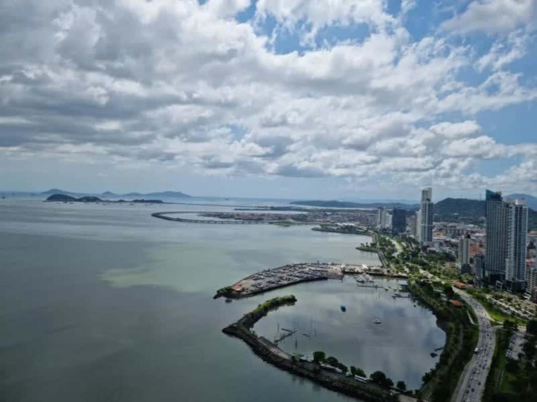 Aerial Panama Bay skyline and Cinta Costera near PH Waters Panama City