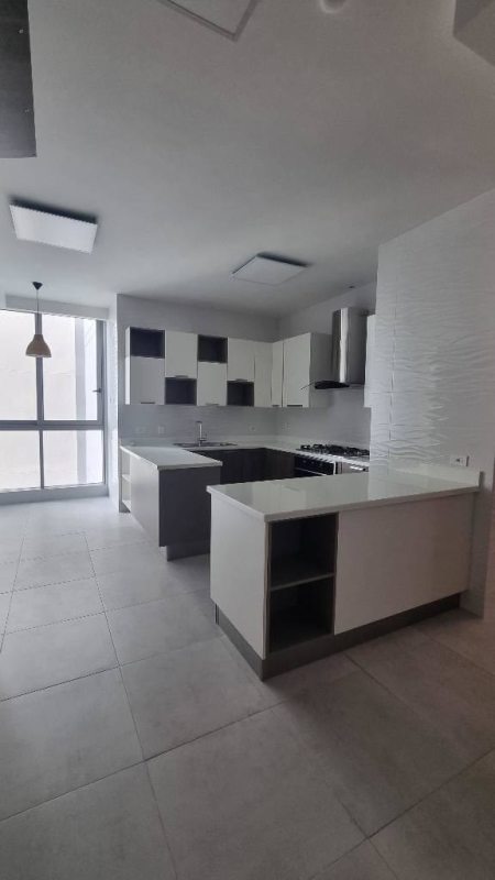 View of city skyline, tennis court, pool and recreation area from PH Regalia Costa del Este Panama