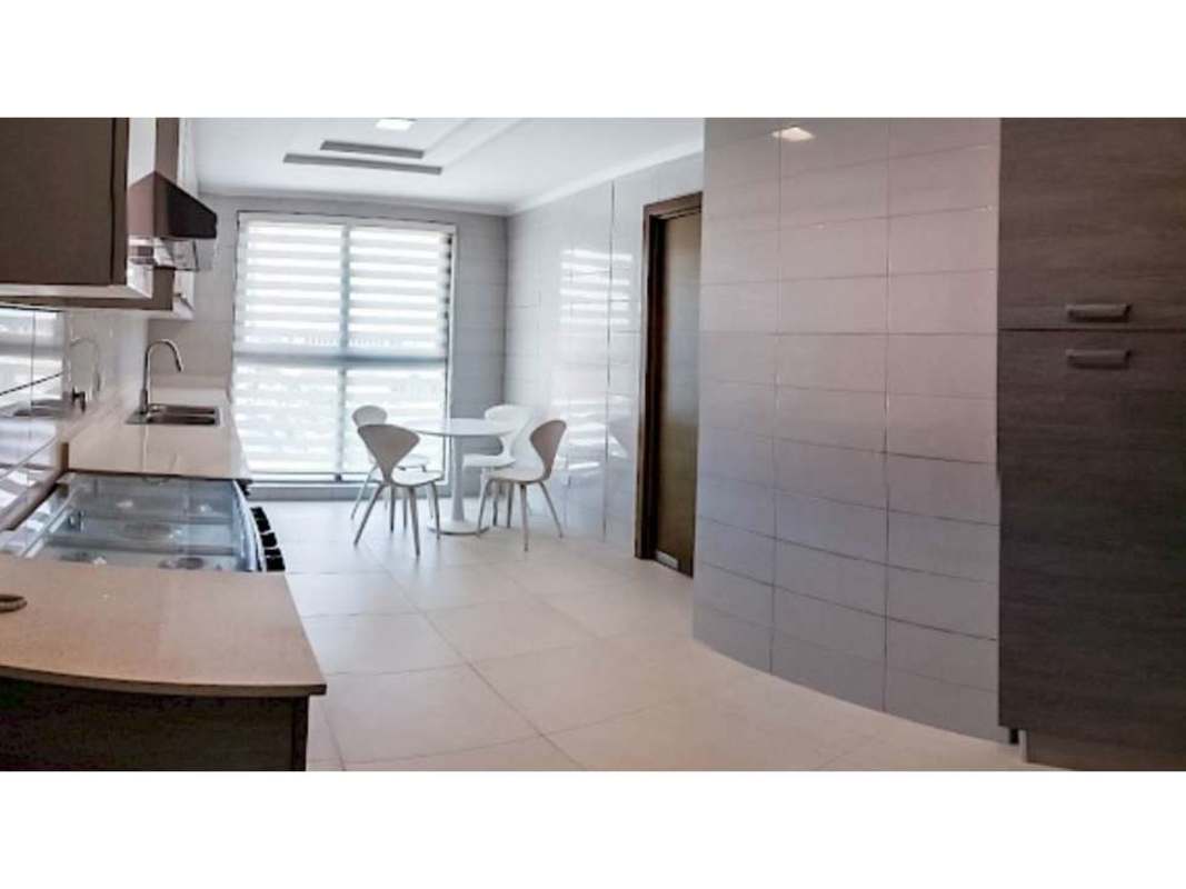 Modern bedroom with upholstered bed, tile floors, AC, and ocean views in PH Park Lane Costa del Este