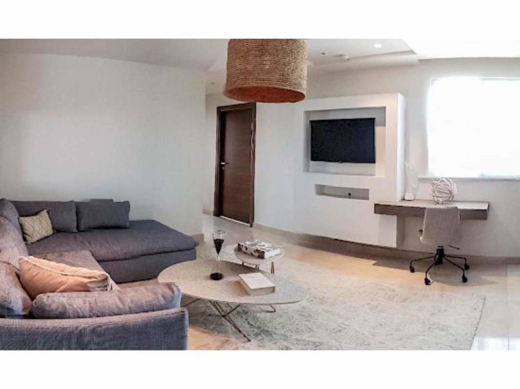 Bright kitchen with stainless steel appliances, granite counters and dining nook PH Park Lane Costa del Este Panama