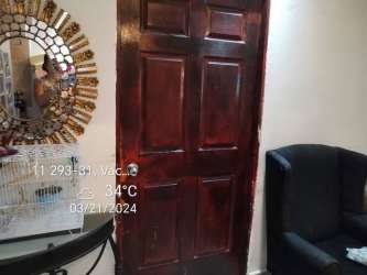 Exterior garden area with decorative plants and colorful spinners Vacamonte