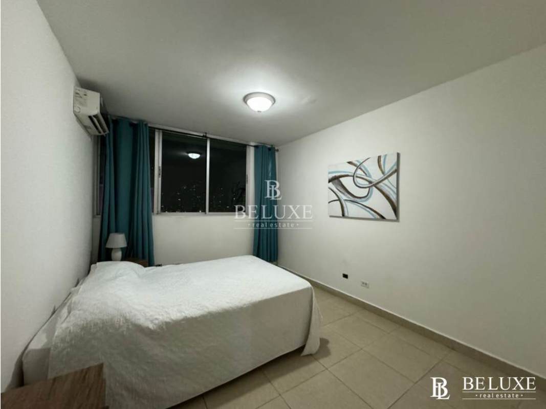 Modern kitchen with granite counters, breakfast bar, and appliances in PH Oasis Tower San Francisco Panama