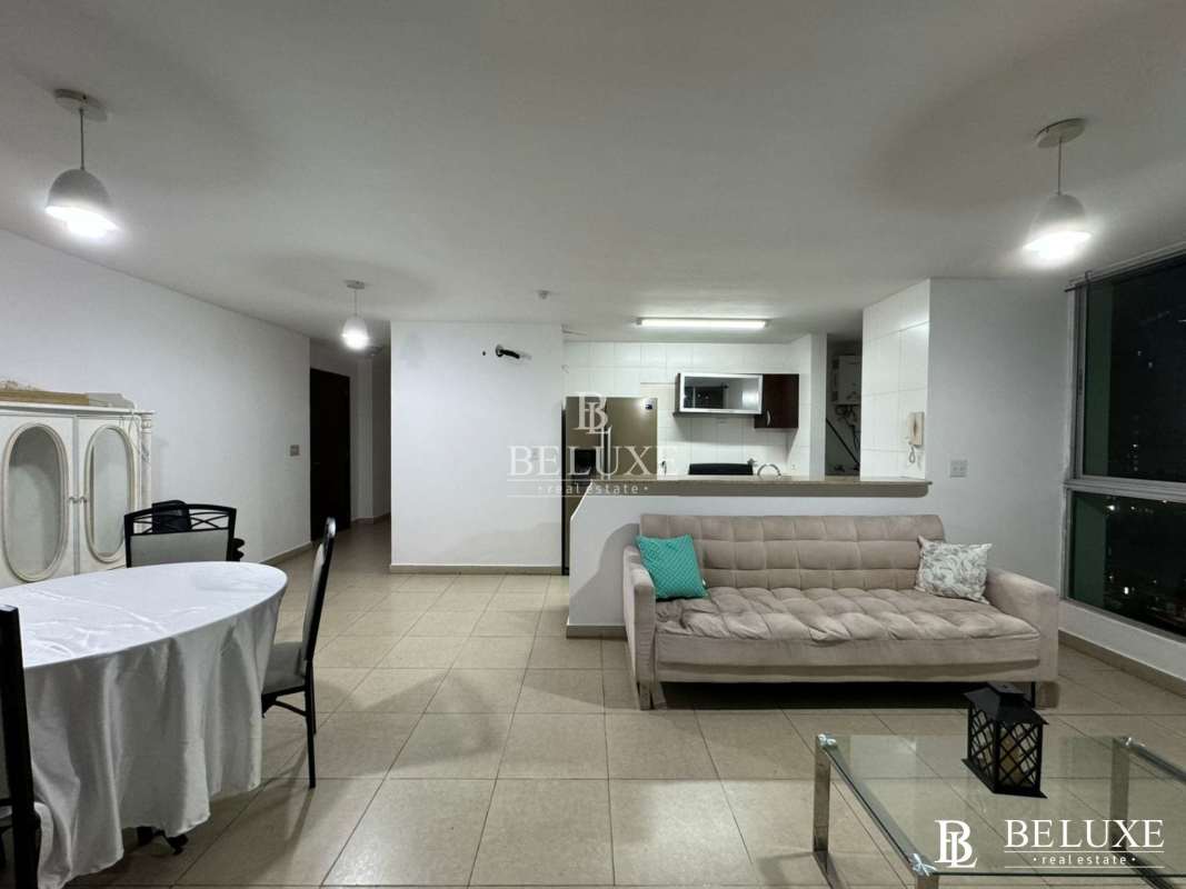 Bedroom with split AC and large window city view in PH Oasis Tower Panama City