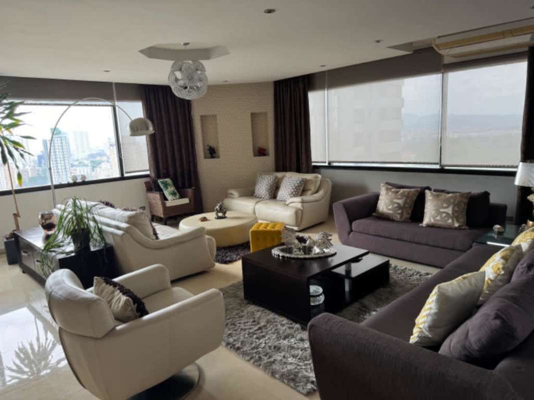 Panoramic living room with large windows city skyline in PH Edificio Elite La Cresta Panama