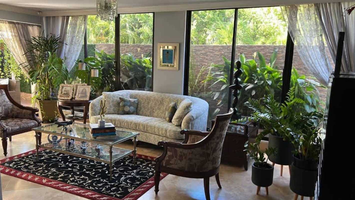 Elegant foyer with curved staircase marble floors Costa Serena Costa del Este Panama