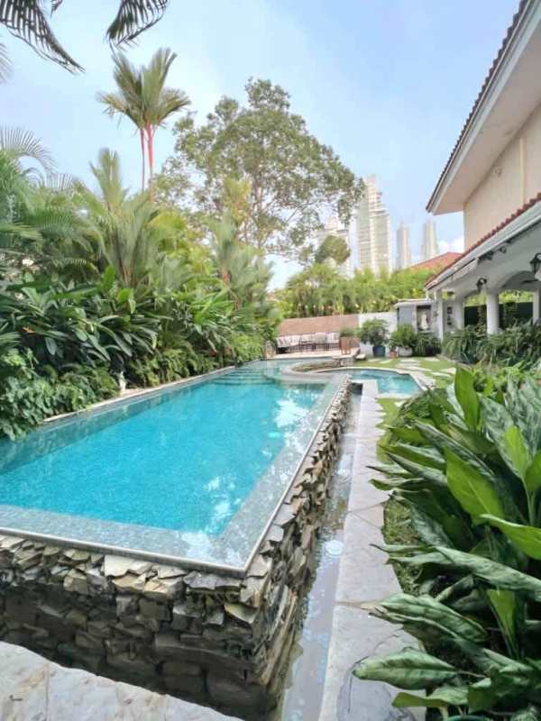 Spacious master bedroom with marble bathroom and walk-in closet in luxury home Costa Serena Panama