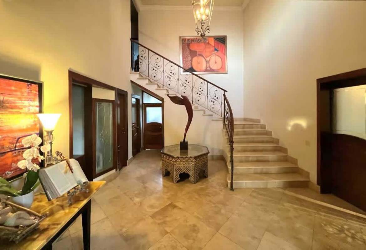 Elegant formal dining room with marble floors and natural light Costa Serena Panama