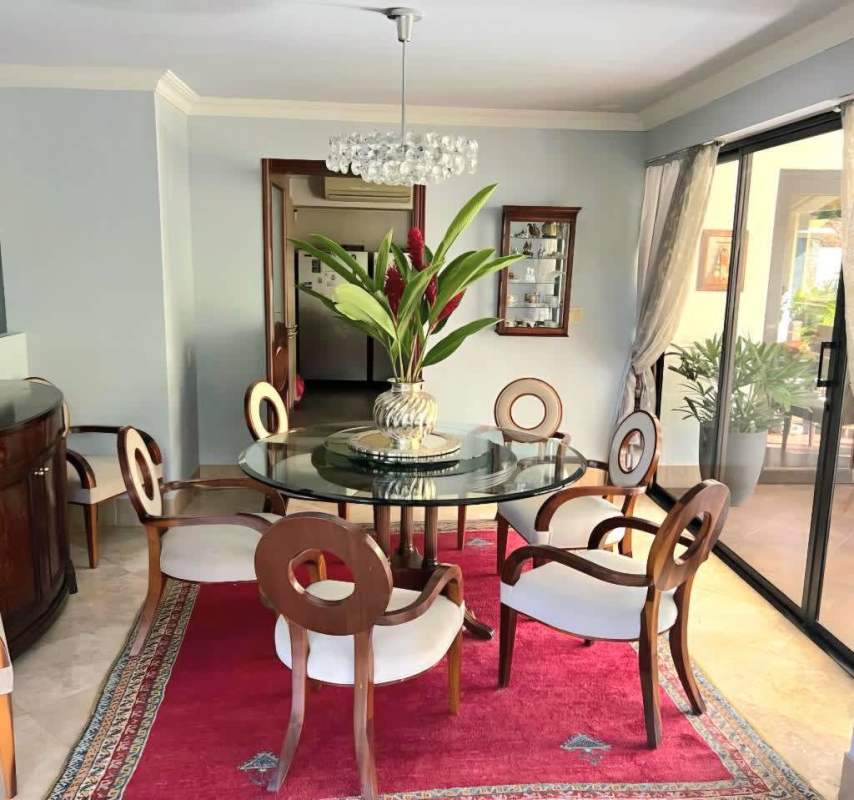 Remodeled gourmet kitchen with granite island and stainless appliances in Costa Serena Costa del Este Panama