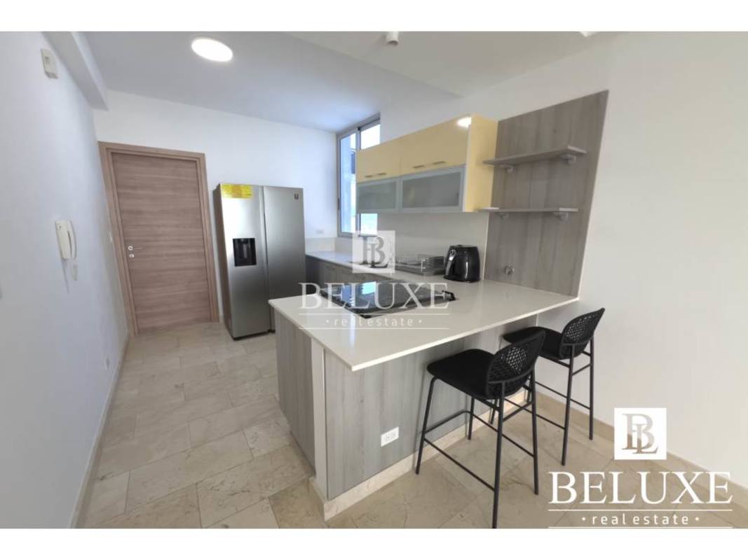 Bedroom with mirrored wardrobe and panoramic city views in Bella Vista Panama