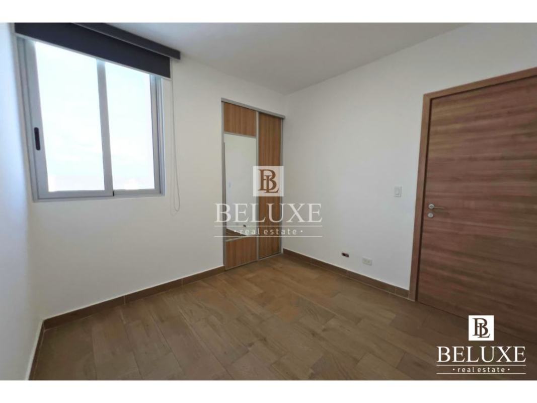 Rooftop infinity swimming pool overlooking skyline PH Dynasty Residences Bella Vista