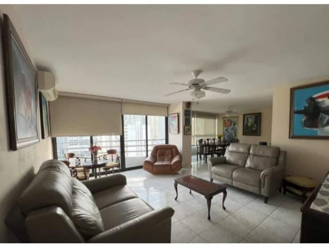 Spacious living dining room with large windows balcony and skyline views PH Mirabel Panama