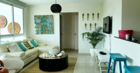 Bright living room with sectional sofa and natural light in PH Rodman Bijao Panama