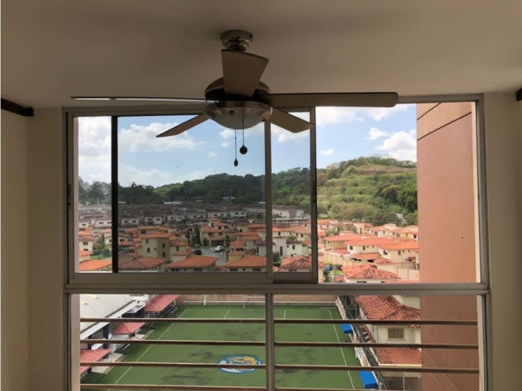 Balcony with neighborhood view and ceiling fan in PH McGregor Condado del Rey Panama