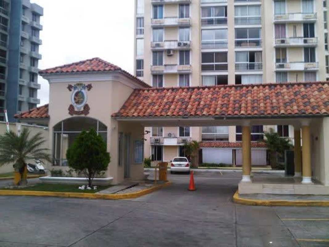 Guarded gate with tiled roof and landscaped entrance PH McGregor Condado del Rey Panama