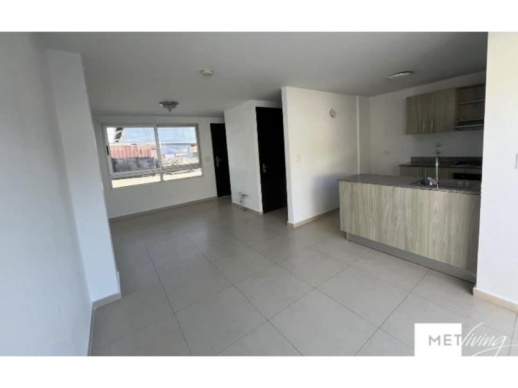 Open floor plan living and dining area with natural light in house for sale Altos del Crisol Villa Lucre Panama