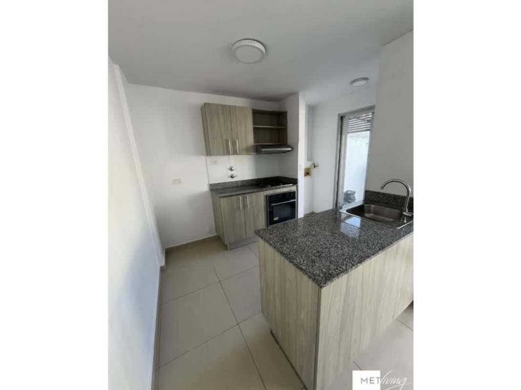 Open concept kitchen with granite counters and built-in stove in Altos del Crisol Villa Lucre Panama City