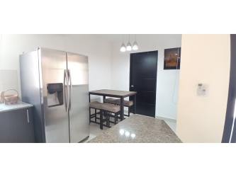 Outdoor terrace patio with stone wall PH Woodlands gated community Panama Pacifico