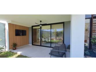 Green home modern kitchen granite countertops natural light IMATERRA Panama Pacifico