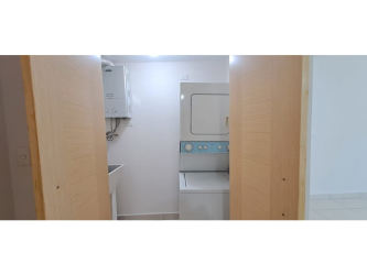 Cozy bedroom with large window and scenic mountain view in PH Mosaic Panama Pacifico