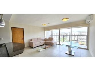Apartment living room with balcony nature view PH Midrise Woodlands Panama Pacifico
