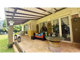 Open family room with large doors to terrace luxury house Veracruz Panama