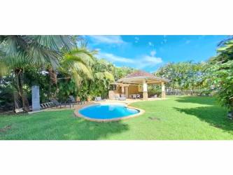 Bright spacious living area with access to gardens in luxury villa Panama