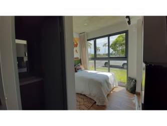 Bright living room open to balcony and dining area PH Centriqo Panama Pacifico for sale