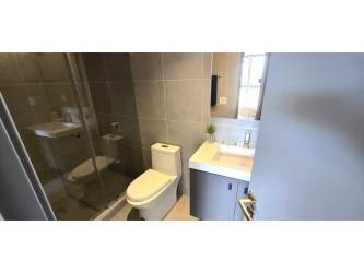 Contemporary bathroom with glass shower enclosure and vanity in Centriqo Panama Pacifico
