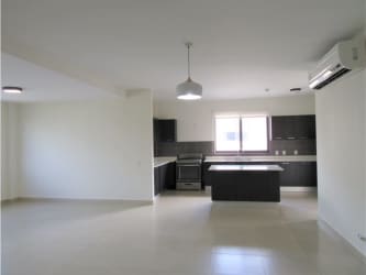 Bright open living dining area with terrace in River Valley condo Panamá Pacífico Panama