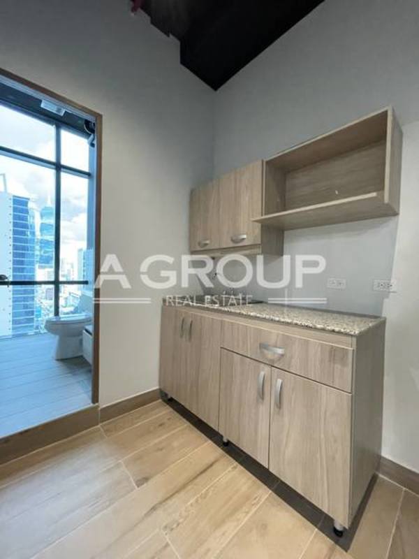Utility kitchenette area with cabinetry in PH Tower Financial Center Panama