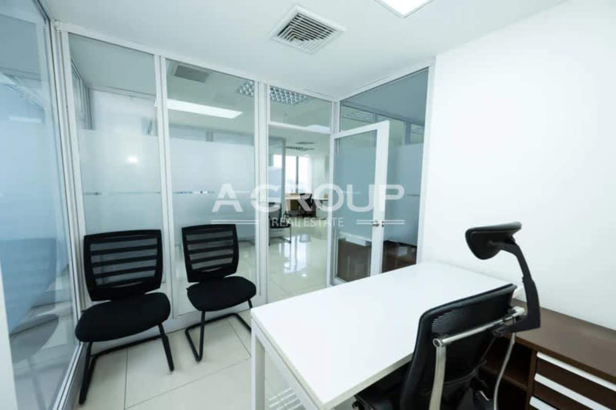 Private office with glass walls, minimalist design at PH BICSA Panama City