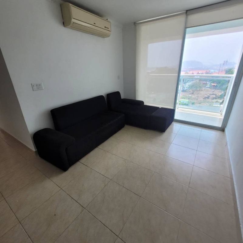 Master bedroom featuring large window, closet, tiled floor at PH Albrook Towers Panama City