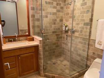 Luxury bathroom with enclosed shower, tile finishes, vanity at Paseo de la Casa Buenaventura Panama