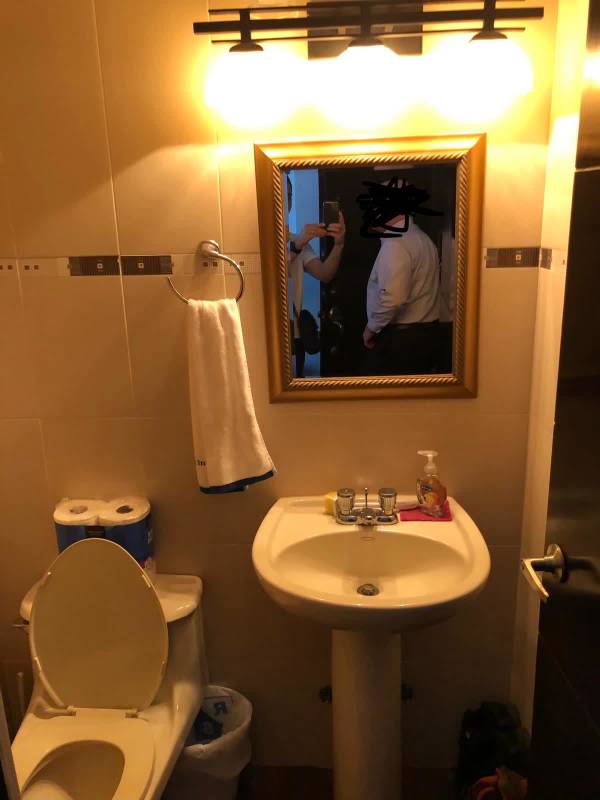 Open modern kitchen with granite countertops and appliances at PH Bayfront Tower Panama City