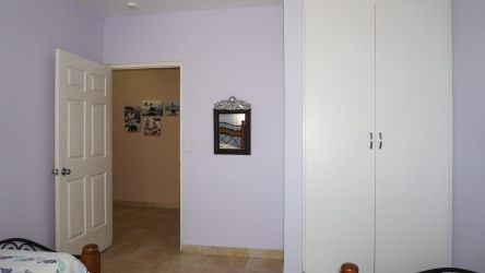 Master bedroom with large window and sea view PH Playa Blanca El Farallón Panama property