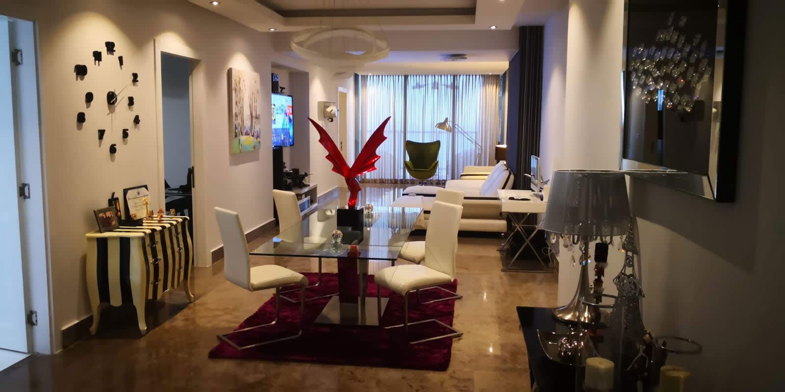 Modern living dining space floor to ceiling windows ocean view PH Yoo Panama