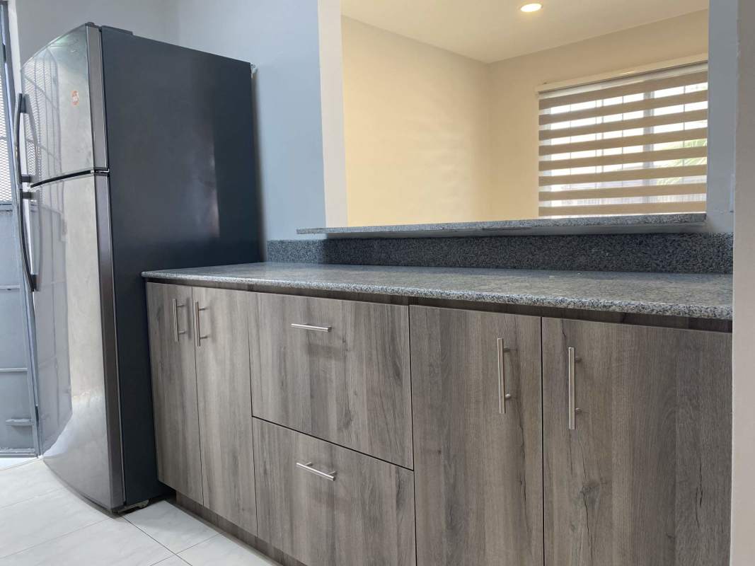 Fully equipped granite countertop kitchen in Don Bosco Mediterráneo house