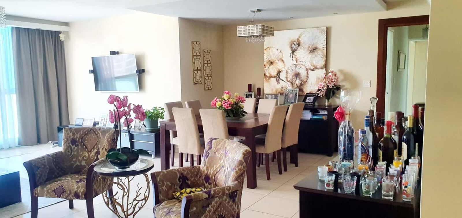 Integrated living dining space with ocean skyline view at PH Parkside