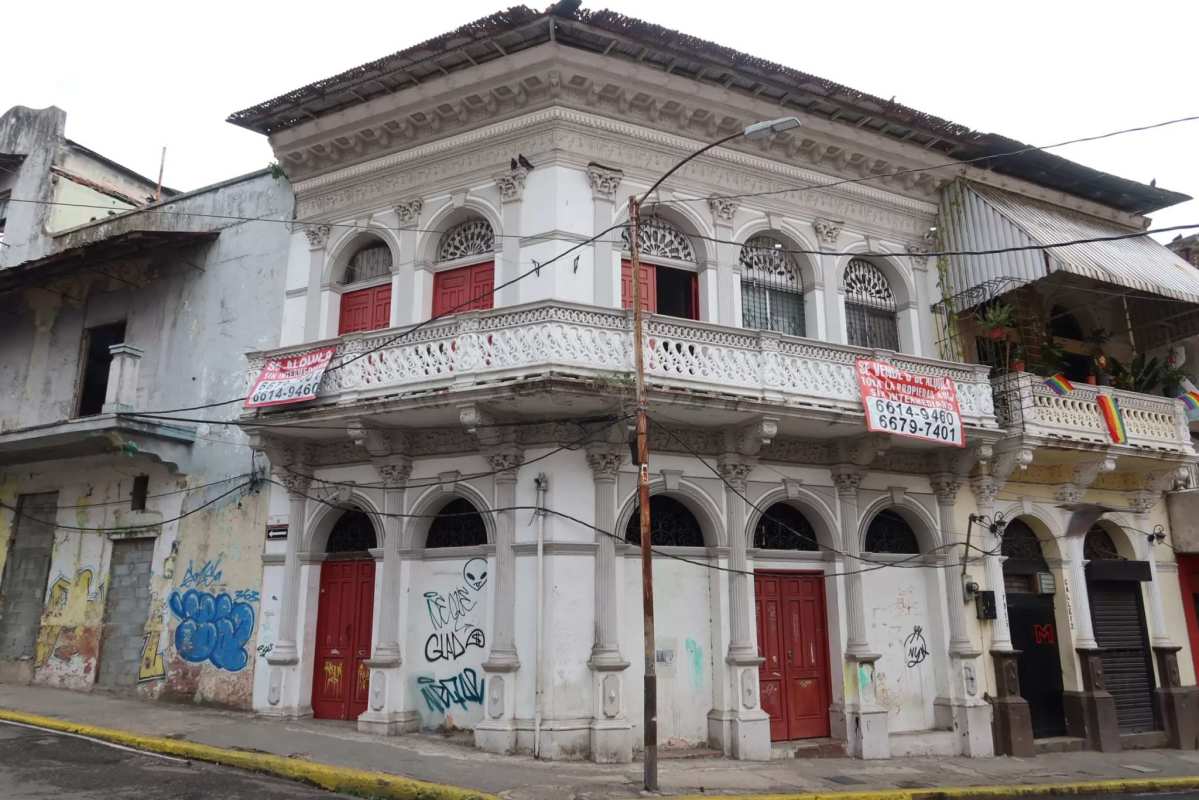 Colonial multi-story building with historic arches and balconies in Casco Viejo Panama City