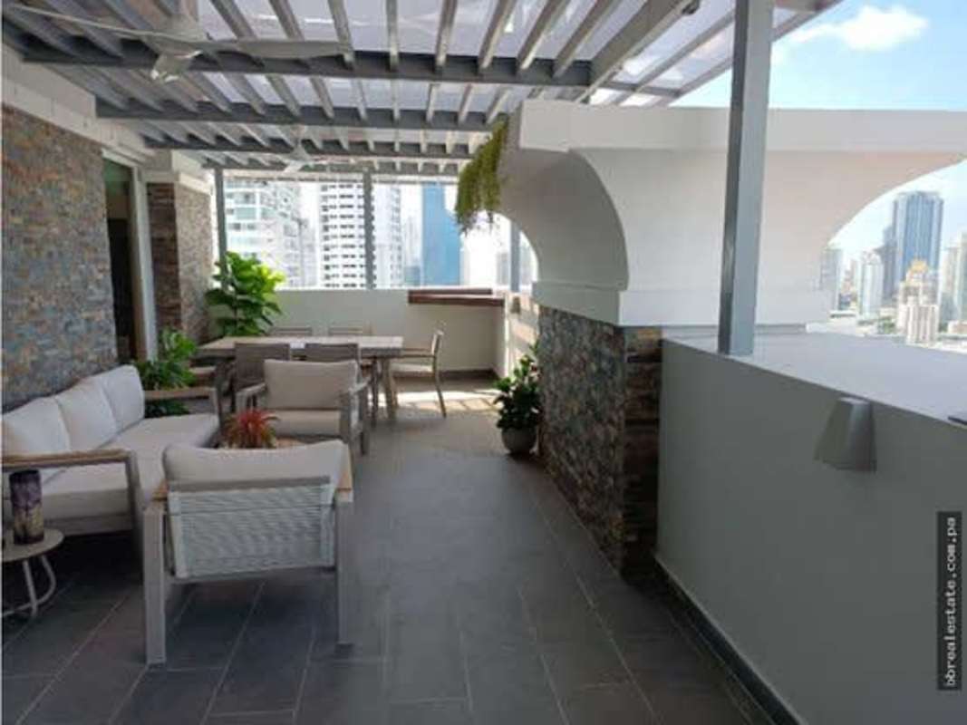 Large wrap-around terrace with bay and skyline view Emporium Tower Penthouse Panama