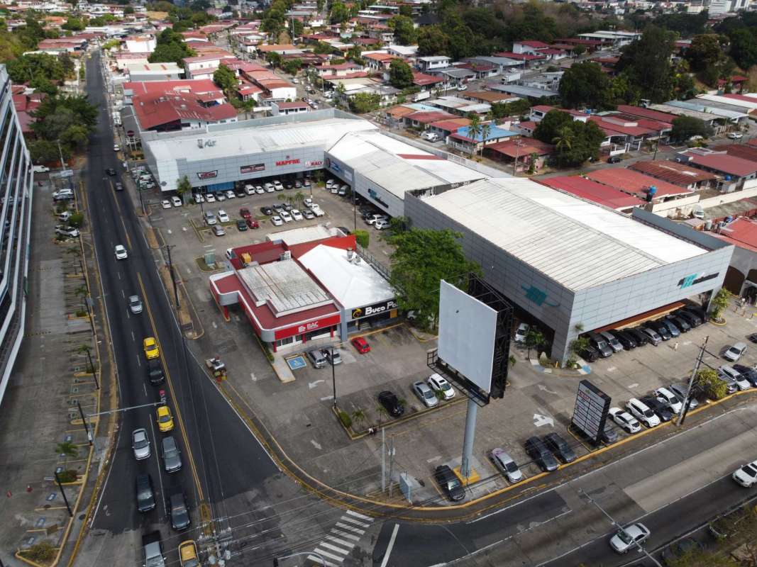 Aerial image commercial center, parking lots, busy streets El Dorado Panama