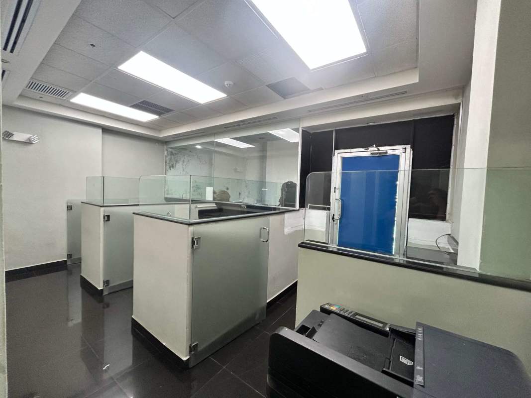Commercial interior with bank-style counters and partitions for rent Panama