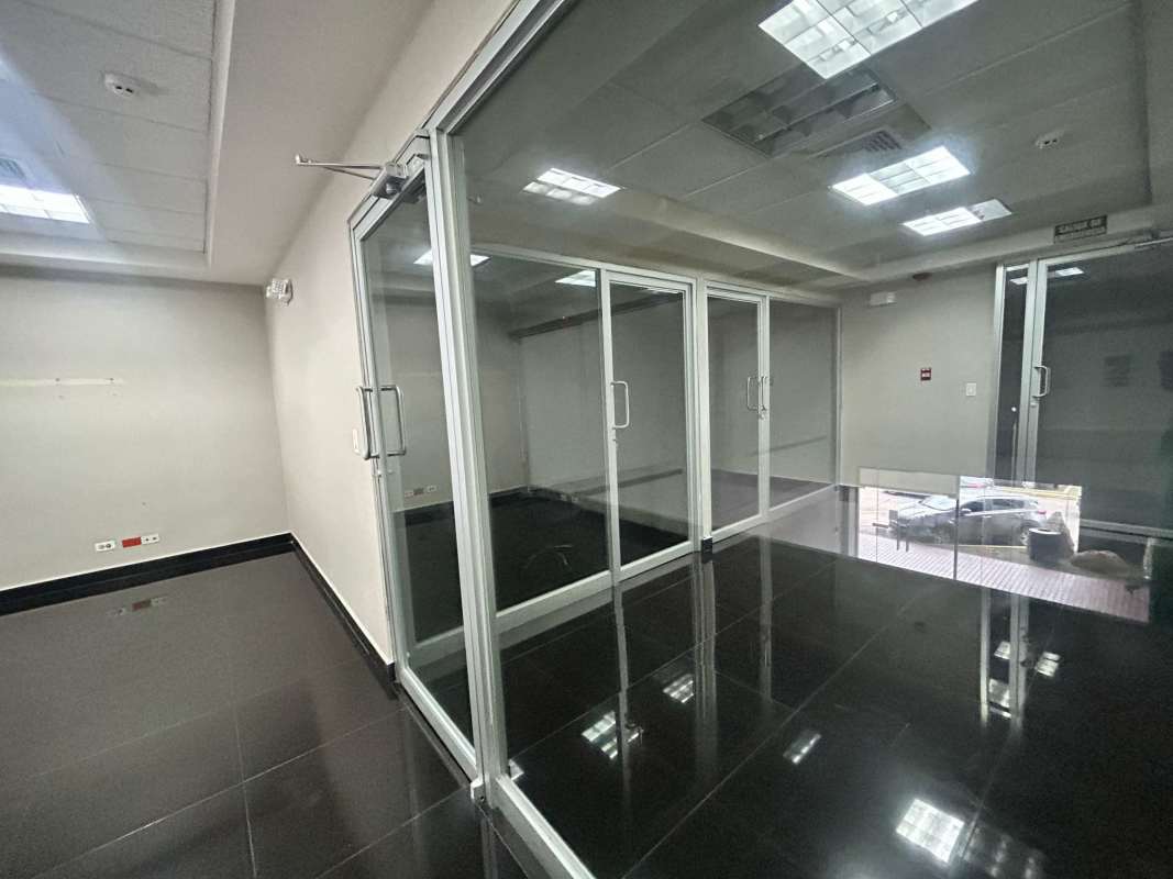 Large glass storefront with view into spacious commercial unit Plaza El Dorado Panama