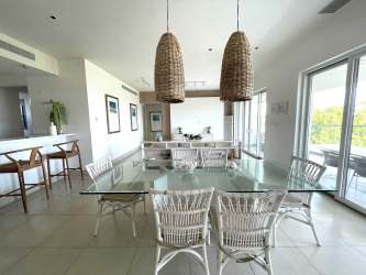 Oceanview master bedroom with large windows in luxury condo Casamar San Carlos Panama