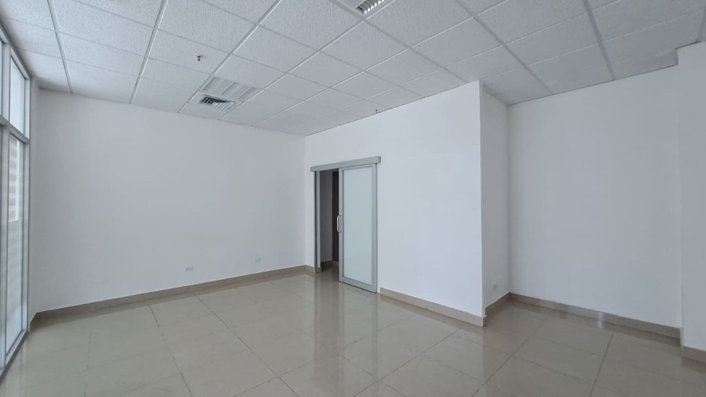 Commercial building lobby elevator emergency stairs Plaza Korintho Panama City